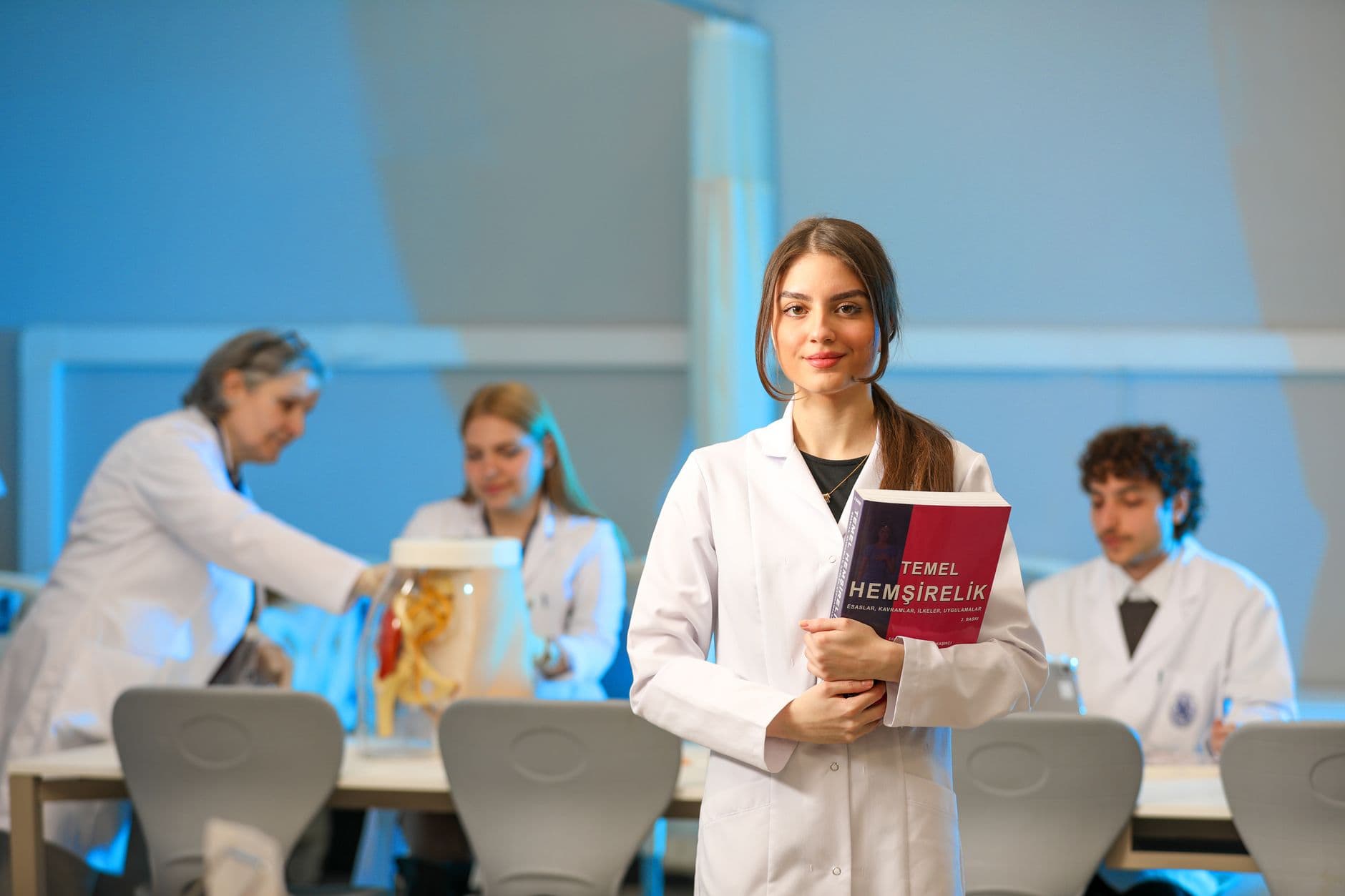 MBBS students learning anatomy in a medical laboratory